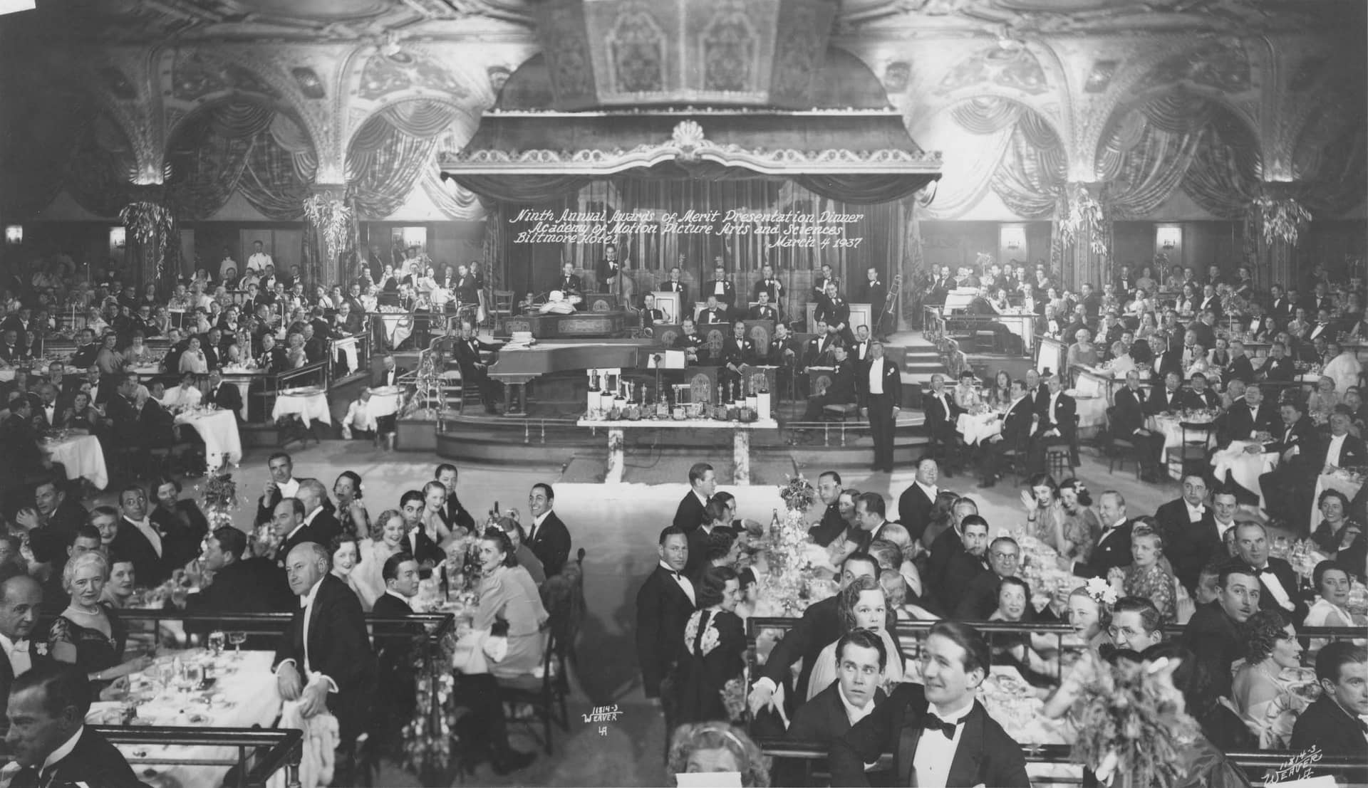 The ninth Annual Awards of Merit Presentation Dinner was held at the Biltmore Hotel on March 4, 1937, featuring guests Cecil B. DeMille (foreground, left), Henry Fonda (foreground, center right), and Walt Disney (far right)
Courtesy of Academy Awards show photographs, Margaret Herrick Library, Academy of Motion Picture Arts and Sciences, photo: Weaver L.A.